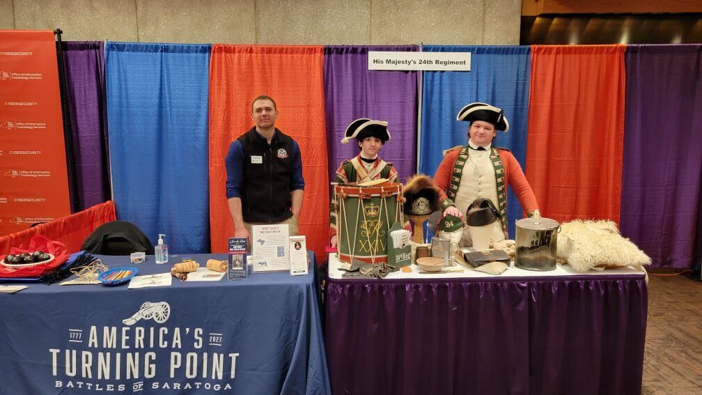 Local residents and students gathered in Fort Hardy Park October 17th for a Surrender Day celebration. Aaron Shellow-Lavine / WAMC
