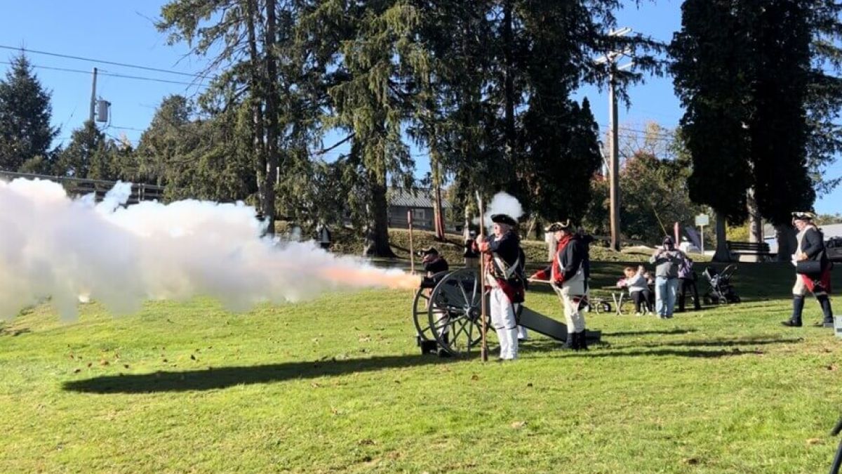Local residents and students gathered in Fort Hardy Park October 17th for a Surrender Day celebration. Aaron Shellow-Lavine / WAMC